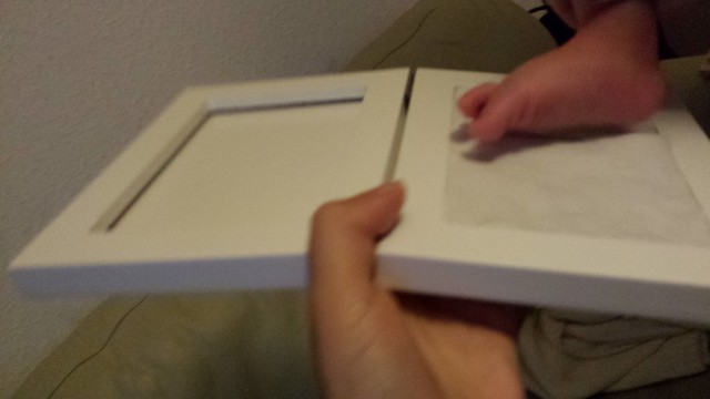 baby footprint in clay