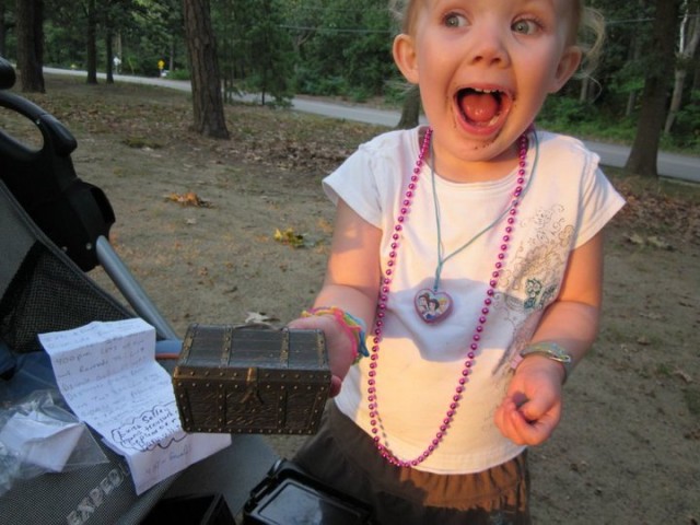 geocaching happy girl found treasure