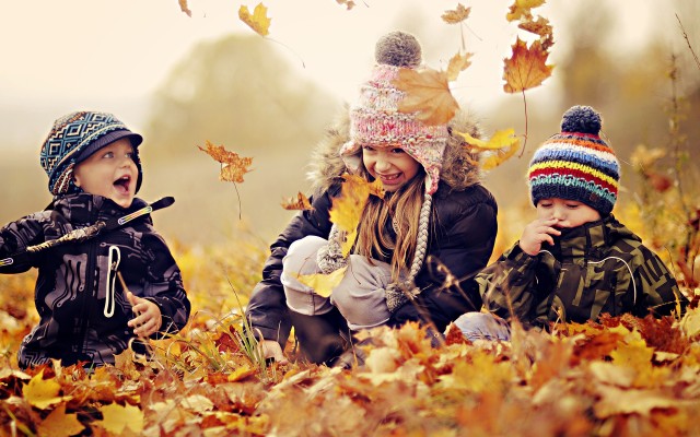 kids in leaves